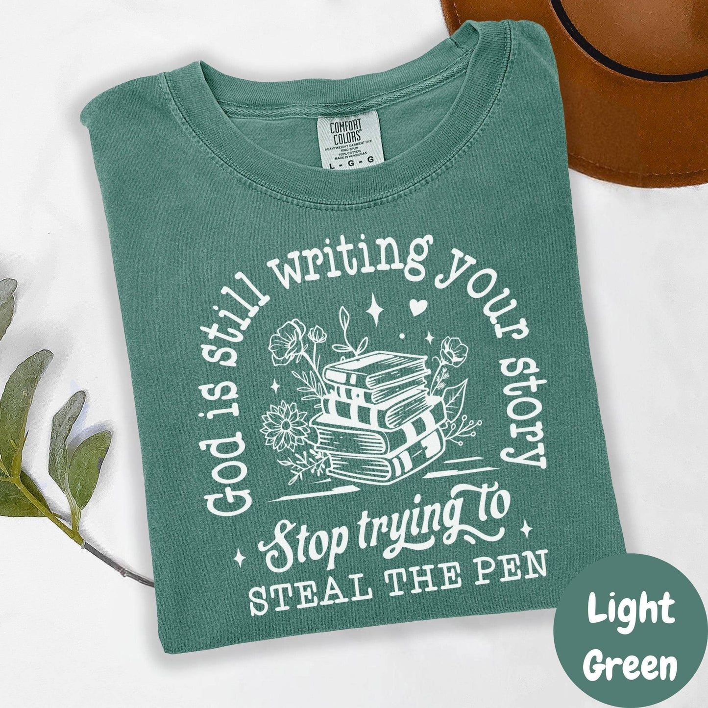 God Is Still Writing Your Story Comfort Colors® Shirt, Christian Quote Tee, Faith-Based Shirt for Women, Inspirational Bible Tee, Trust God