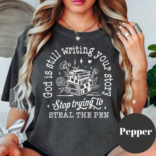 God Is Still Writing Your Story Comfort Colors® Shirt, Christian Quote Tee, Faith-Based Shirt for Women, Inspirational Bible Tee, Trust God