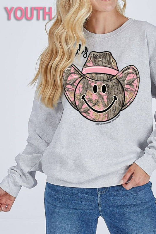 Howdy Pink Camo Cowboy Hat Smiley Face YOUTH-CREW-HOWDY-FLURRY Off White Long Sleeve Crew by Simply Southern