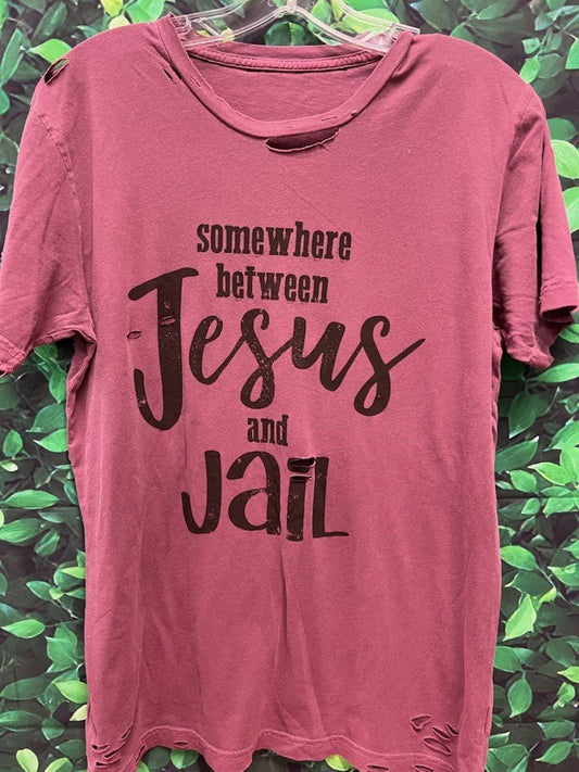 Somewhere Between Jesus and Jail maroon color destroyed tee